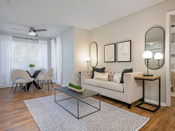 Enjoy this cozy space for a seating area, dining room, or a bright office with perfect lighting.