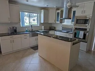Kitchen with custom granite counter tops