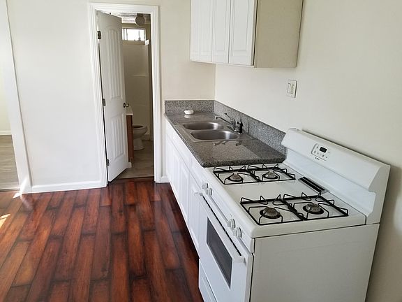 Newer kitchen with granite counter top/New Laminate flooring.
