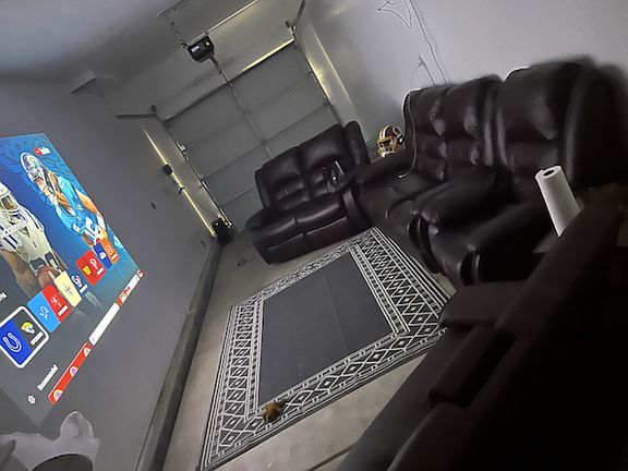 2 car garage. converted into a cinema room and painted white.
