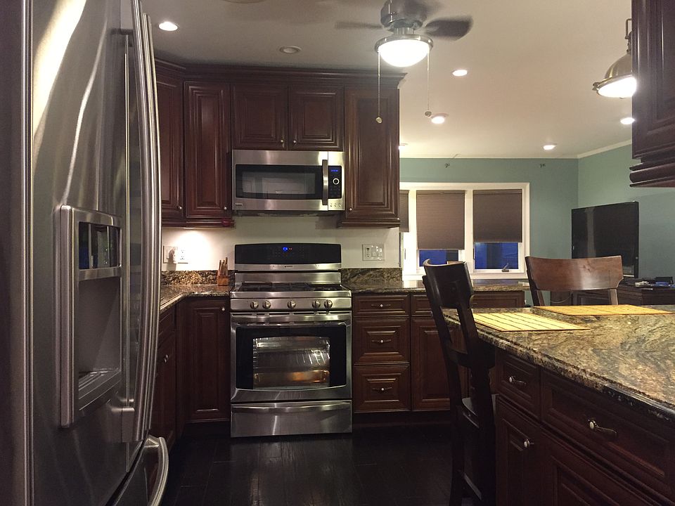 Cherry Cabinets/SS Appliance