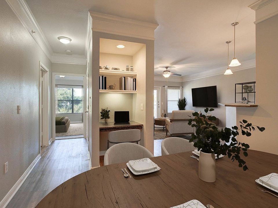 Open Floor Plan Living Area with Built-In Desk