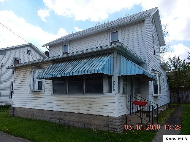 1st image of 114 E 1st St