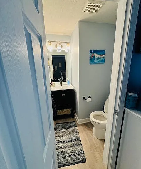 Bathroom located off the kitchen