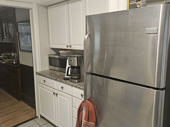 Large appliances included in kitchen. Plenty of cabinets. granite countertops. gas stove