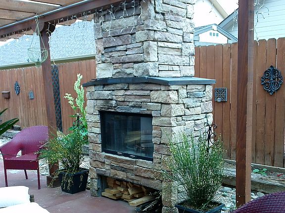 Fireplace under pergola
