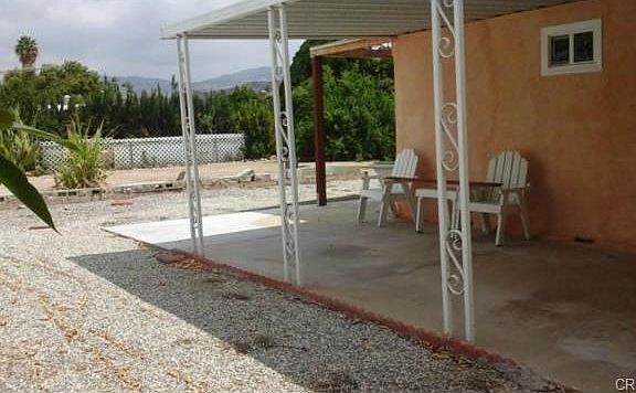 SIDE PATIO, ACROSS FROM FRUIT TREES