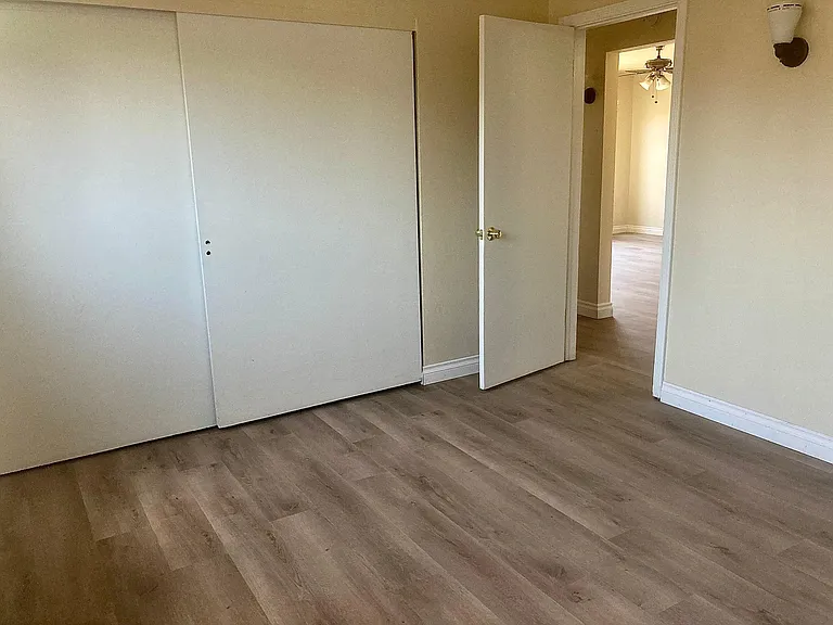 1 of 2 bedrooms, laminate flooring and and 4.5" baseboards throughout