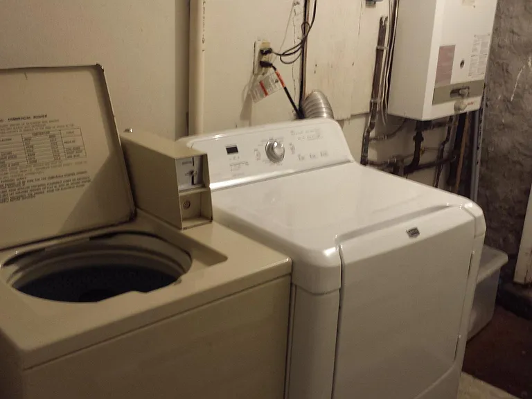 Laundry Area adjacent to this apartment