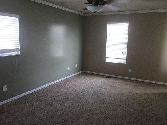 master bedroom with 2 windows