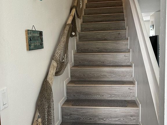 Stairs to bedrooms and full bath. (Gate will be gone)