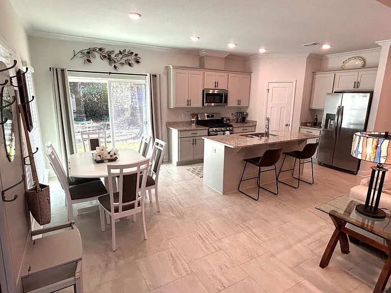 kitchen and dining view upon entering through front door
