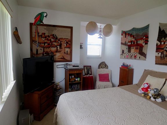 2nd Bedroom- bed and decor are staged