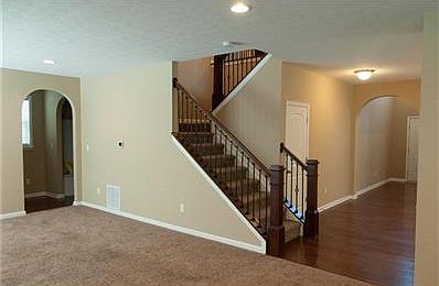 Your dining room has a great line of sight through the rest of the main level. The main level also has a powder room.