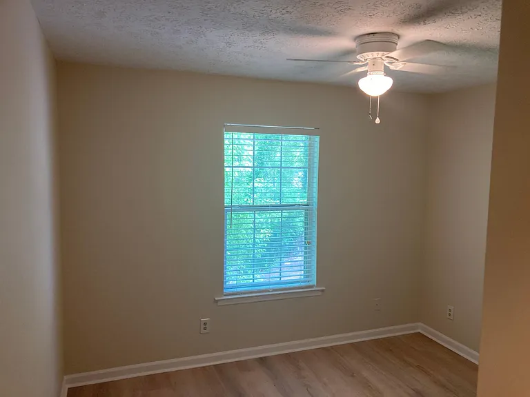 Bedroom 3 with natural / private views in the trees.