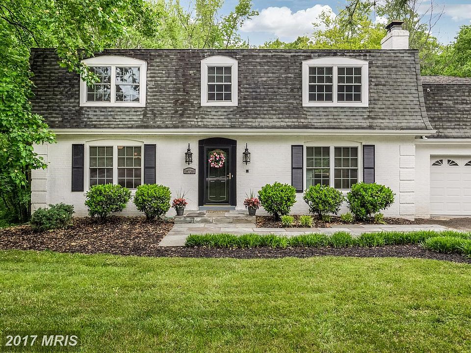 Classic French Colonial in waterfront community.
