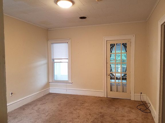 Living room with porch for summer nights. 