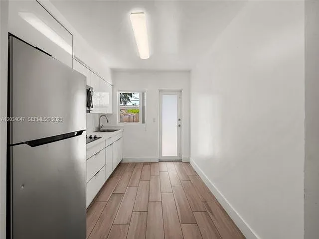 520 NW 104th St — Photo 7