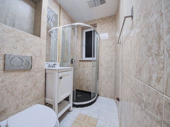 4th image of 61-12 Woodbine St #303