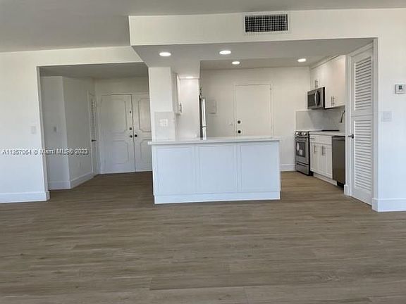 2nd image of 9800 W Bay Harbor Dr APT 404