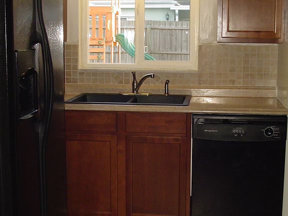 Full-size Dishwaser & Side-By-Side Fridge with Dispenser