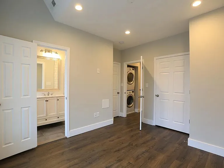 Upper Level Street-facing Bedroom with en-suite bathroom
