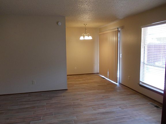 dining area and slider to enter private yard