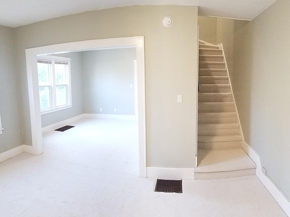 Looking from living room into dining room / stairs