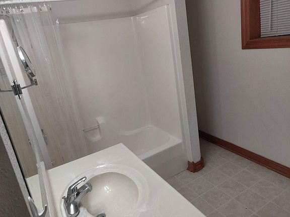 Downstairs bathroom vanity and shower/tub combo
