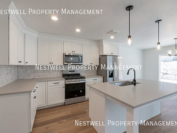 3rd image of 718 N Gillan Way