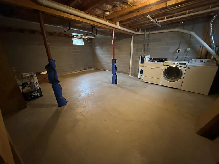 basement with washer and dryer, offering extra space and convenience.