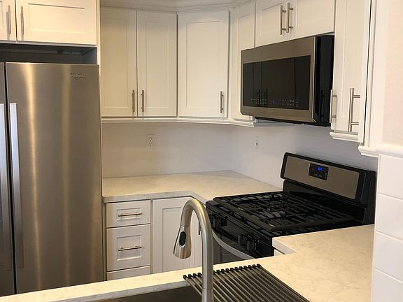 Huge new stainless steel sink, built-in soap dispenser