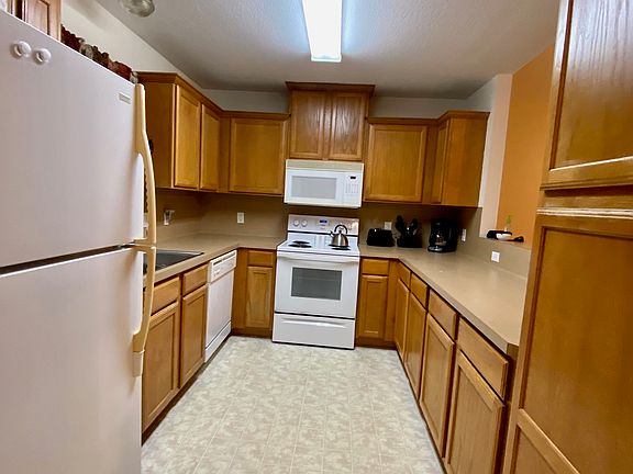 Kitchen with refrigerator