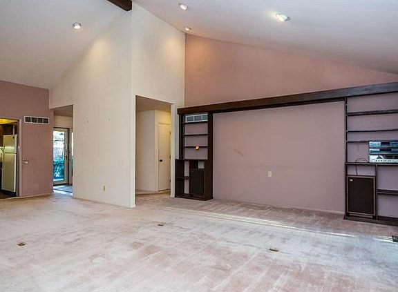Built-ins provide storage & structure to open plan