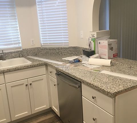 From Kitchen opening to dine and living area.