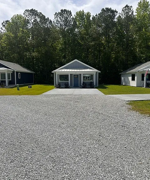 Spacious 2-car driveway, plus additional parking near the front of the community.
