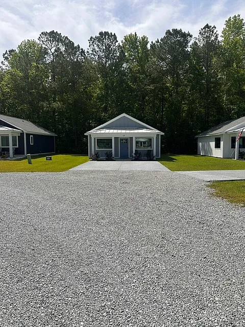 Spacious 2-car driveway, plus additional parking near the front of the community. - 129 Long Pond Loop