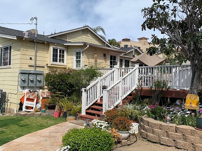 Separate Entrance with deck. Deck is on the east side of the house so it get lovely morning sun