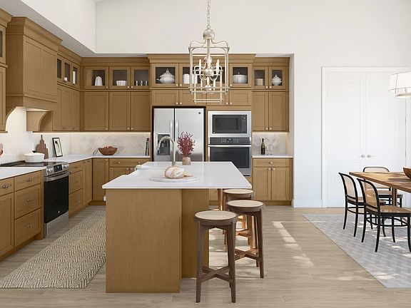 Kitchen with vaulted ceiling and gorgeous cabinets
