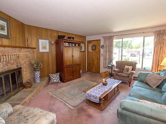 Formal Living Room with Rock Fireplace