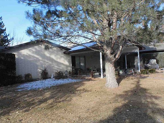 Rear of home w/covered patio