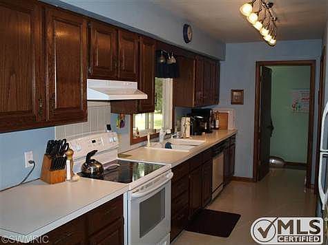 18' x 9' kitchen with 8' x 5' laundry/half bath