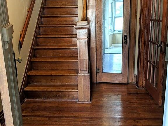This is your beautiful entry. Get ready to see more original woodwork all through out this home!