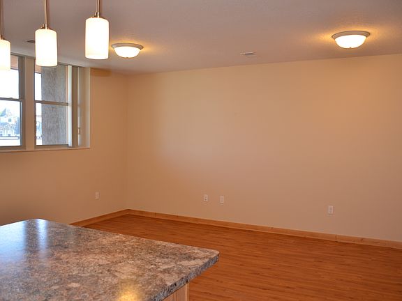 Large living room with lots of natural light