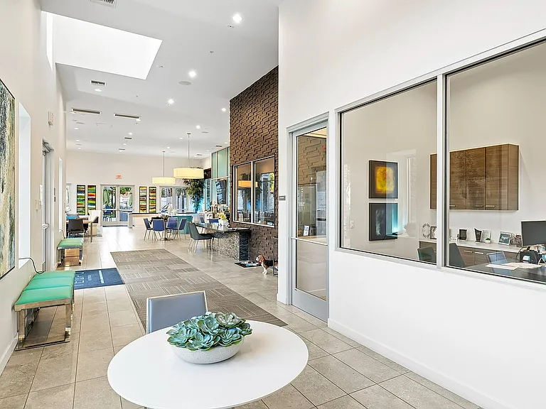 Bright and inviting community room at Tempo at Riverpark