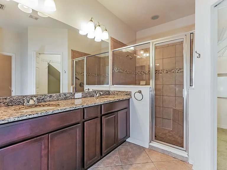 8309 Deerland Bluff Ln — Photo 12