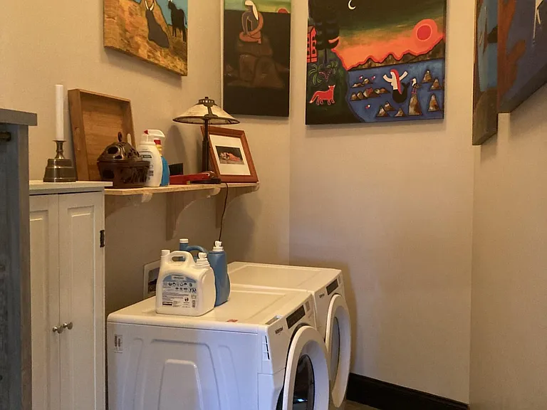 Laundry room offers full services of washer and dryer