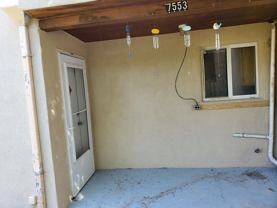 Front door to main house with small porch