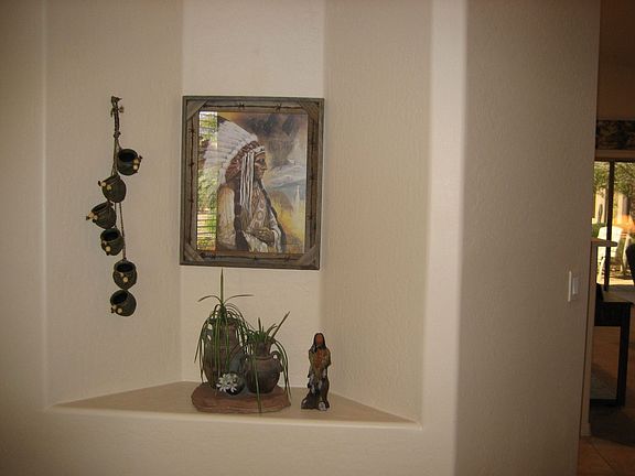 Decorative niches,vaulted ceilings add charm to this rady to move-in home!