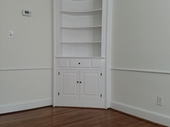 dining room with corner cabinet